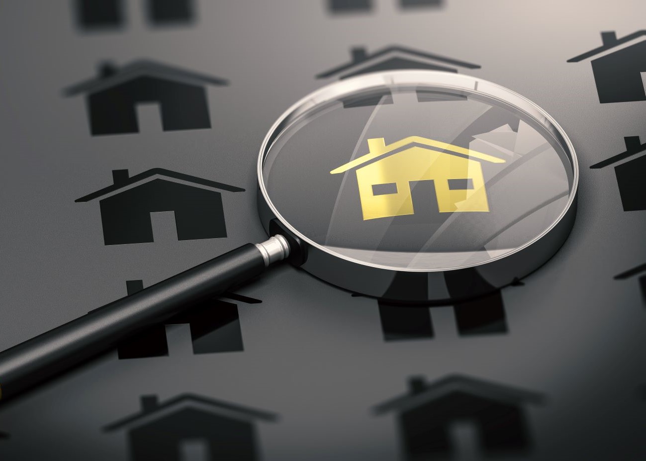 magnifying glass over house image